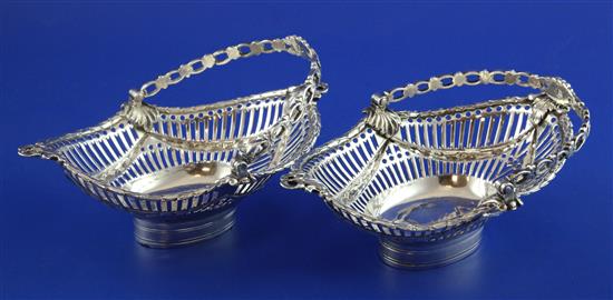 A pair of George III pierced silver epergne baskets, 10 oz.